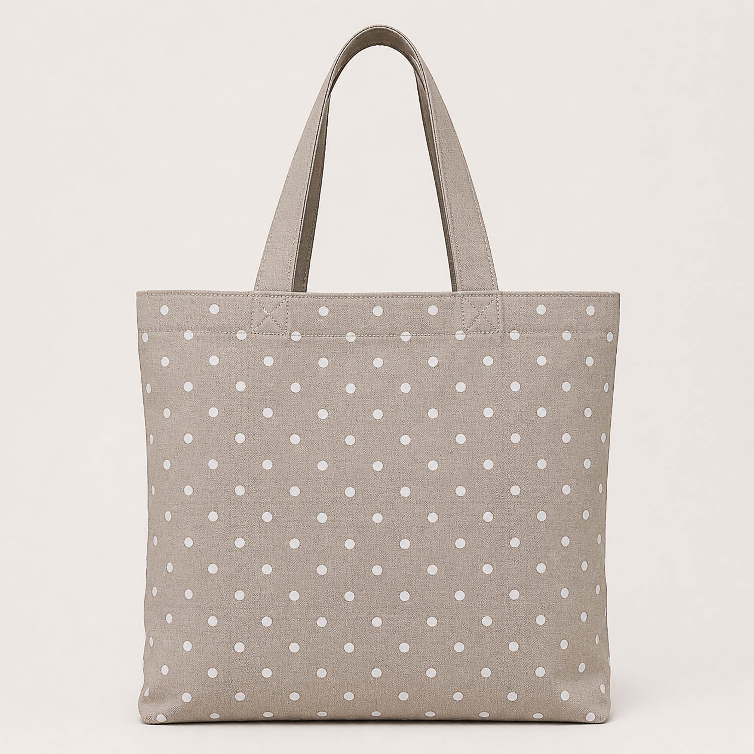 Canvas with white polka dots on a beige background - Ribes y Casals