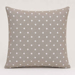 Canvas with white polka dots on a beige background - Ribes y Casals