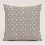 Canvas with white polka dots on a beige background - Ribes y Casals