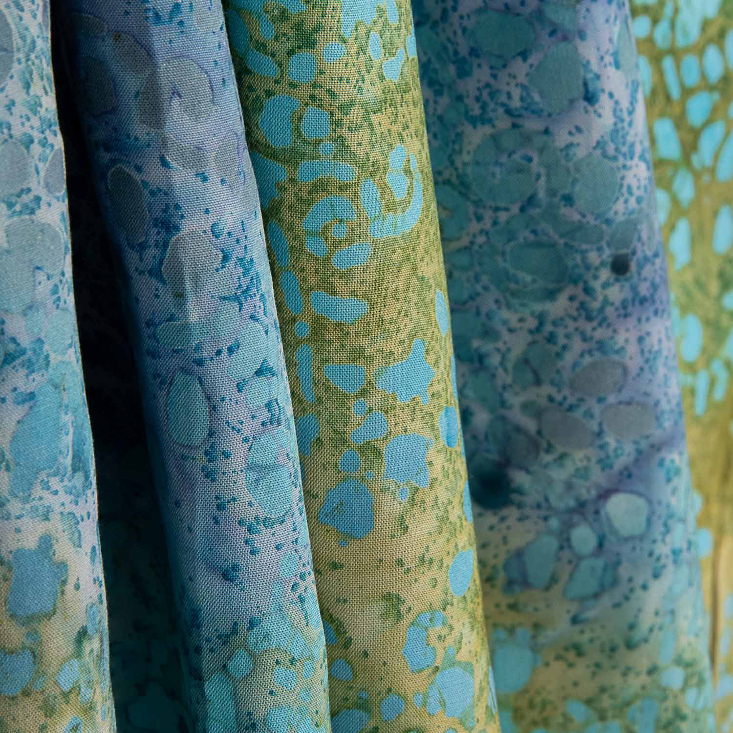 Turquoise and Ochre Batik Cotton Dot - Ribes y Casals