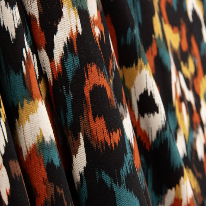 Animal Print Satin Viscose Fabric in Brick Red - Ribes y Casals