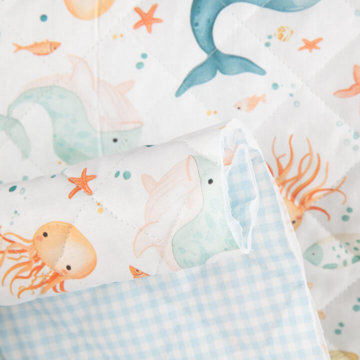 Reversible ‘Ocean of Dreams’ and Blue Gingham Quilted Blanket - Ribes y Casals