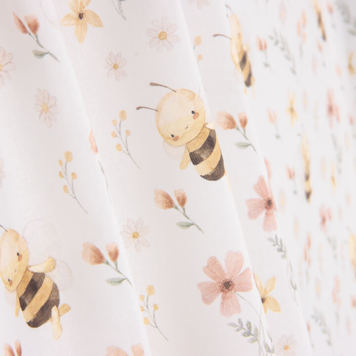 Percale printed with a pattern of bees and flowers - Ribes y Casals