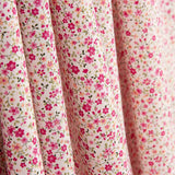 Organic Cotton Poplin with Fuchsia Thousand Flowers Print - Ribes y Casals