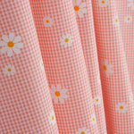 Organic Cotton Poplin with Vichy and Daisy Print Coral - Ribes y Casals