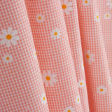 Organic Cotton Poplin with Vichy and Daisy Print Coral - Ribes y Casals