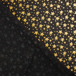 Metallic Printed Stretch Fabric – Iridescent Gold Stars - Ribes y Casals
