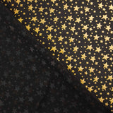Metallic Printed Stretch Fabric – Iridescent Gold Stars - Ribes y Casals