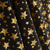 Metallic Printed Stretch Fabric – Iridescent Gold Stars - Ribes y Casals
