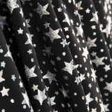 Metallic Printed Stretch Fabric – Iridescent Silver Stars - Ribes y Casals