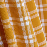 Pumpkin and White Checked Cotton Piqué Fabric - Ribes y Casals