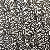 Tela Gasa Hojas Blancas Fondo Negro - Ribes y Casals